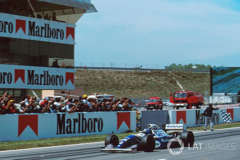 Hill celebrates victory for Williams - the team's first since the tragic death of Senna