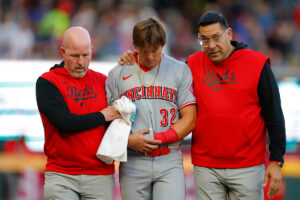 Reds rookie Tyler Callihan suffers fractured left arm after slamming into outfield wall in loss to Braves