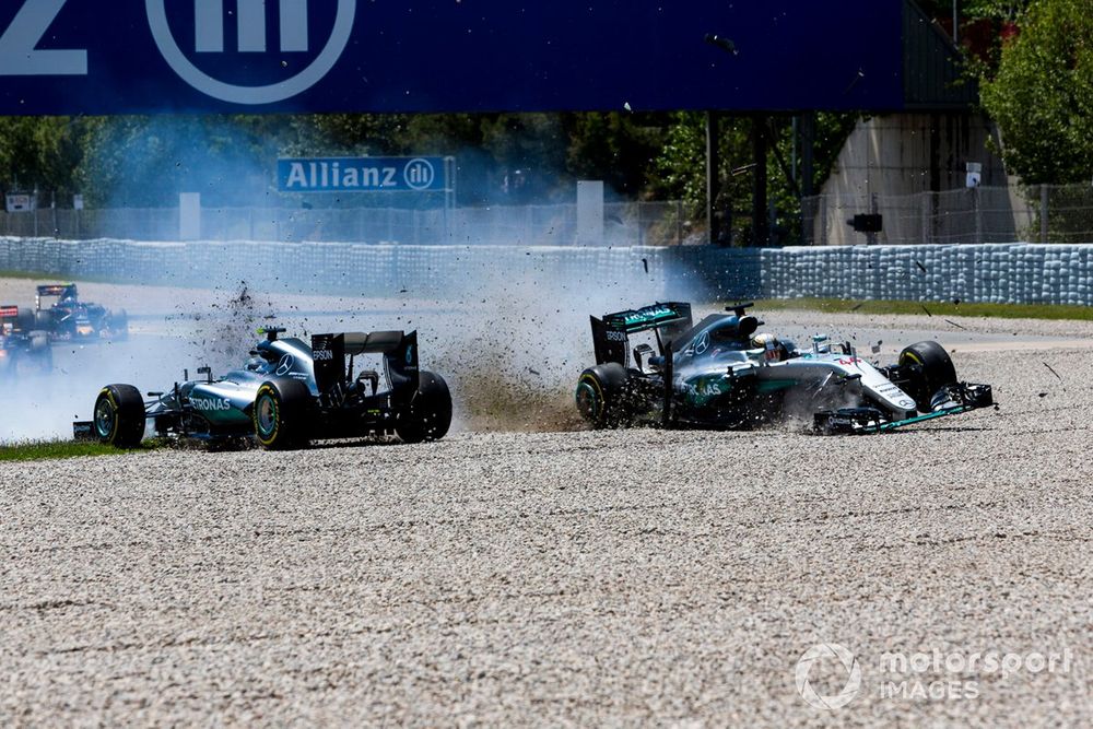 Lewis Hamilton, Mercedes AMG F1 W07 Hybrid and Nico Rosberg, Mercedes AMG F1 W07 Hybrid collide on the opening lap