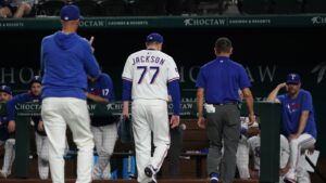 Rangers closer Luke Jackson takes comebacker off pitching hand on his only pitch against Rockies