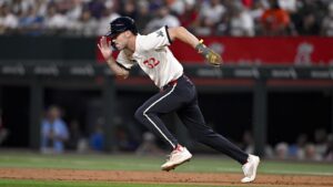 Rangers place outfielder Evan Carter on IL with quad strain, activate Kevin Pillar