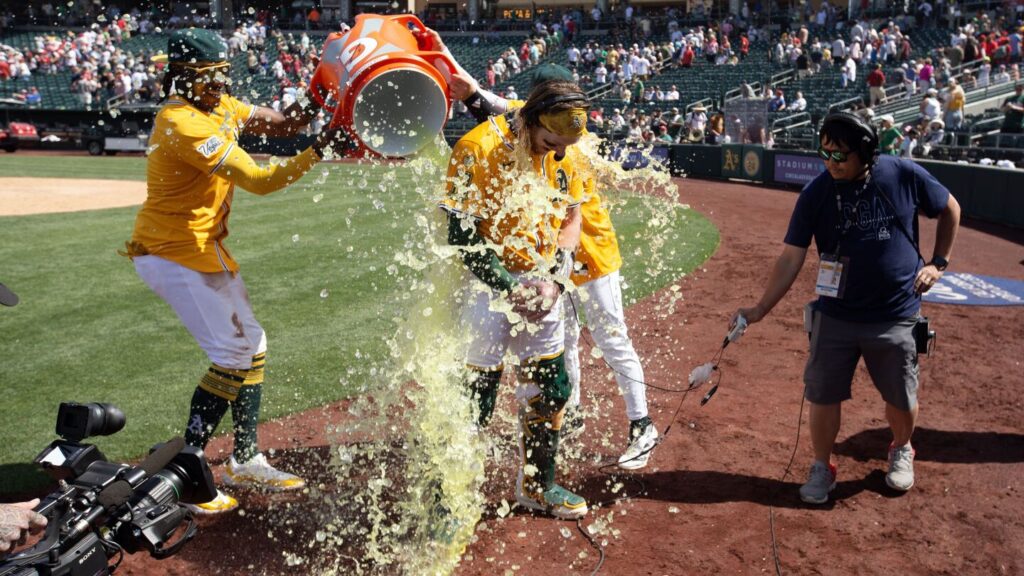 A’s catcher MacIver gets go-ahead hit, throws out runner to end game in big league debut at age 28