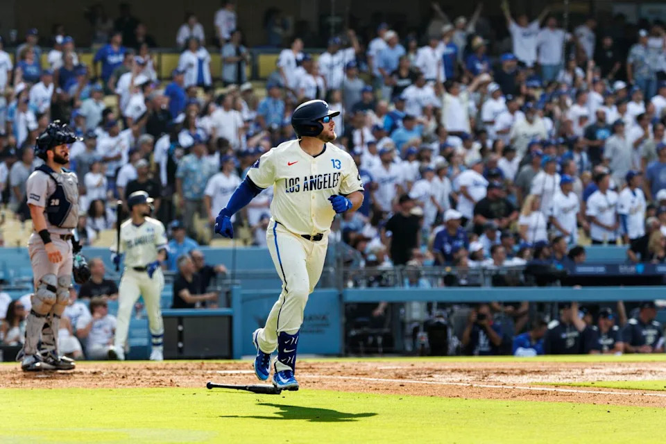 Max Muncy hits a three-run home run in the second inning for the Dodgers on Saturday.