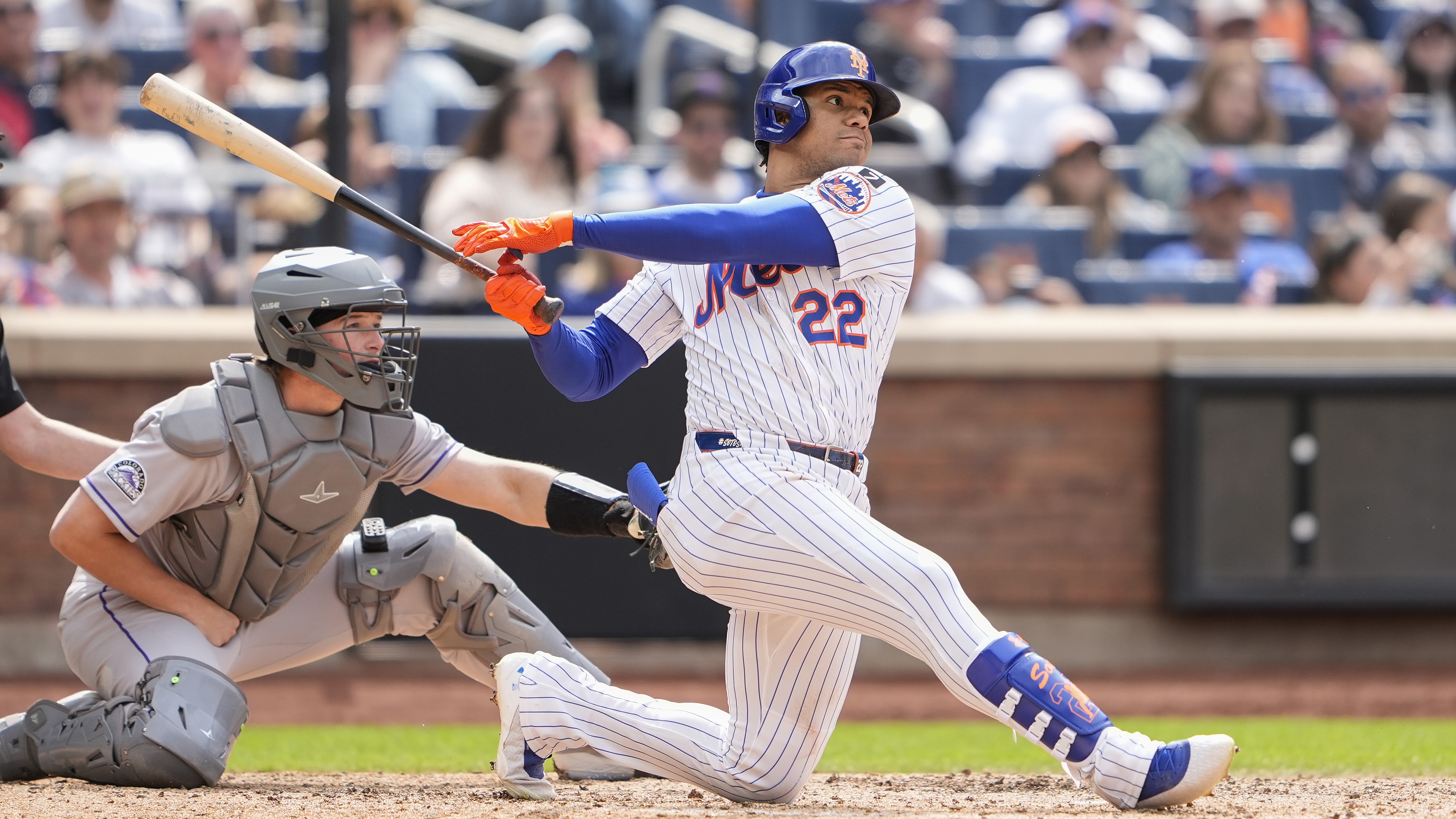 Jun 1, 2025; New York City, New York, USA; New York Mets right fielder Juan Soto (22) hits a home run against the Colorado Rockies during the eighth inning at Citi Field.
