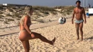 ‘World’s most beautiful footballer’ strips down to bikini for beach keepie-uppies leaving fans in awe