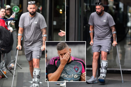 Tony Bellew seen hobbling out of Soccer Aid hotel with protective boot and crutches after suffering horror injury