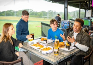 Swing into Summer with Topgolf’s Hot Deals and Beloved Hits