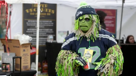Seahawks sign former track star who once announced an NFL Draft pick, hoping to boost offense