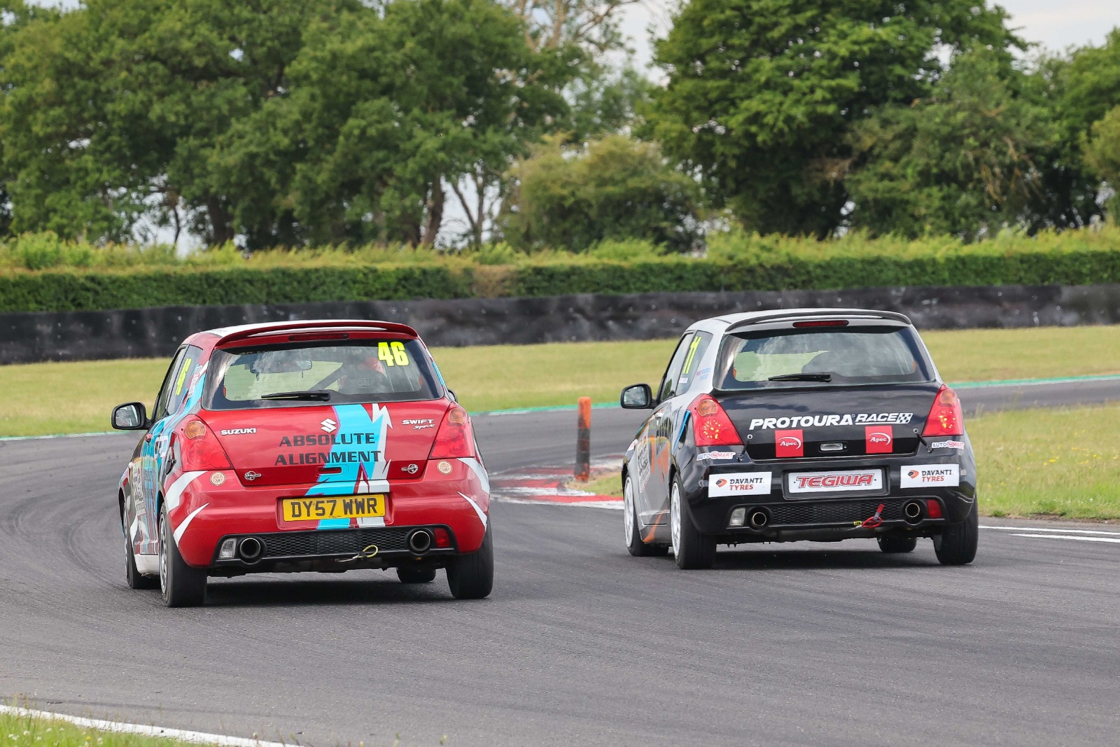 Chris Dear (46) got the better of Adam Blair (11) in busy Swift Sport Challenge contests