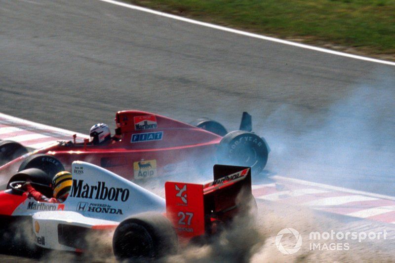 Alain Prost, Ferrari 641 and Ayrton Senna, McLaren MP4/5B collide at the start
