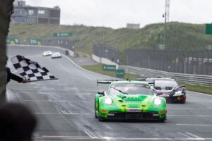 Guven wins chaotic race in the rain
