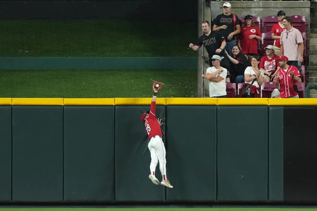 Reds’ TJ Friedl robs late game-tying home run to stun Brewers, end Milwaukee’s win streak
