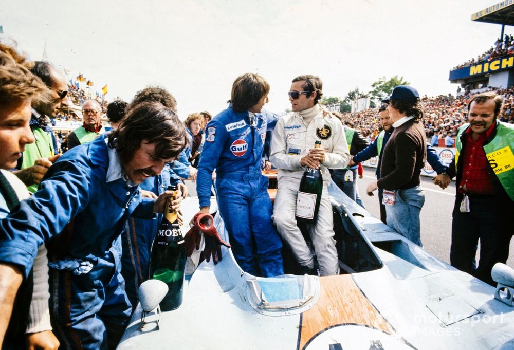 Bell and Ickx celebrate victory in the Gulf GR8 - even if the Ford Cosworth engine did cause a late-race headache