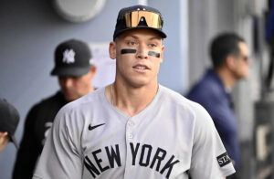 Aaron Judge bobbles catch after bump with fan, gets interference call on umpire review