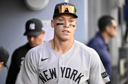 Aaron Judge bobbles catch after bump with fan, gets interference call on umpire review