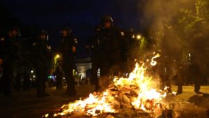 PSG fans ‘tear gassed’ by riot police as violence erupts on streets of Paris after Champions League final win