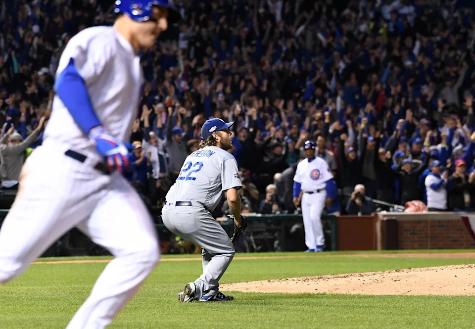 Clayton Kershaw drops to the ground after giving up a home run to the Cubs' Anthony Rizzo in Game 6 of the 2016 NLCS.