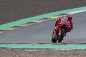Marc Marquez strolls to wet pole as rivals battle