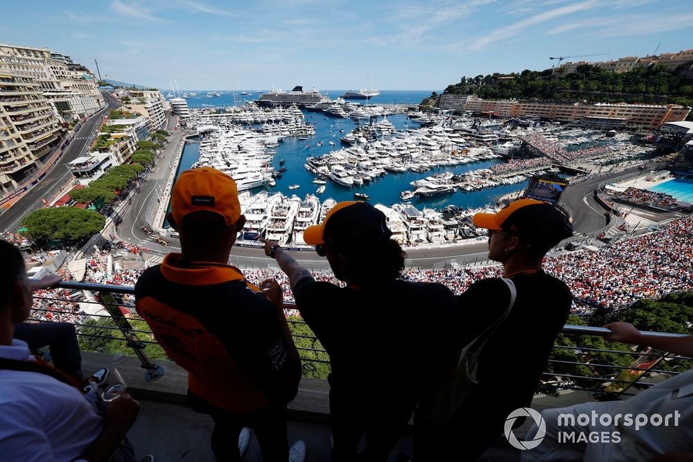 McLaren fans watch from a balcony during the F1 Grand Prix of Monaco
