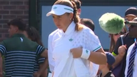 Female Wimbledon star lifts up skirt as she is questioned over breaking all-white dress code