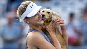 ‘So adorable’ – Pet dog runs on court to celebrate as Emma Raducanu is beaten by Anna Kalinskaya in Washington