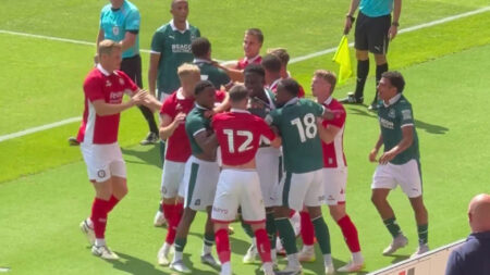 Pre-season clash descends into huge brawl with League One star shoved to floor in tense clash