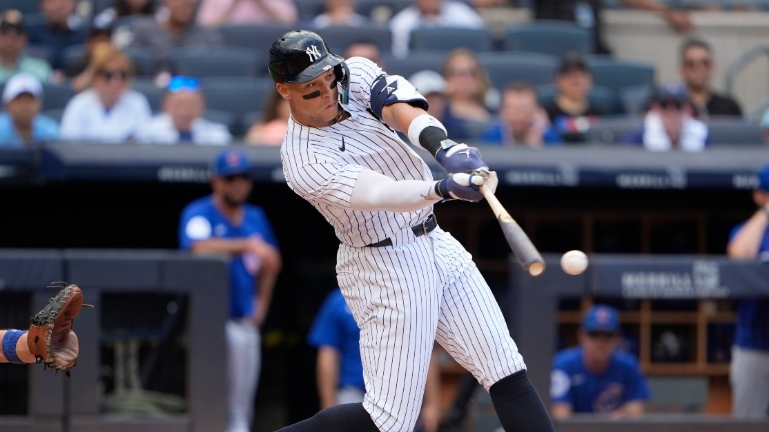 New York Yankees right fielder Aaron Judge (99) hits a double during the fourth inning at Yankee Stadium.
