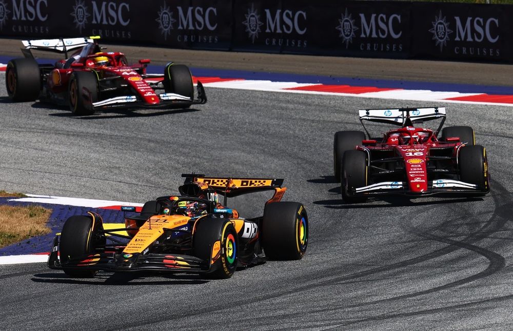 Charles Leclerc's Ferrari follows Oscar Piastri's McLaren
