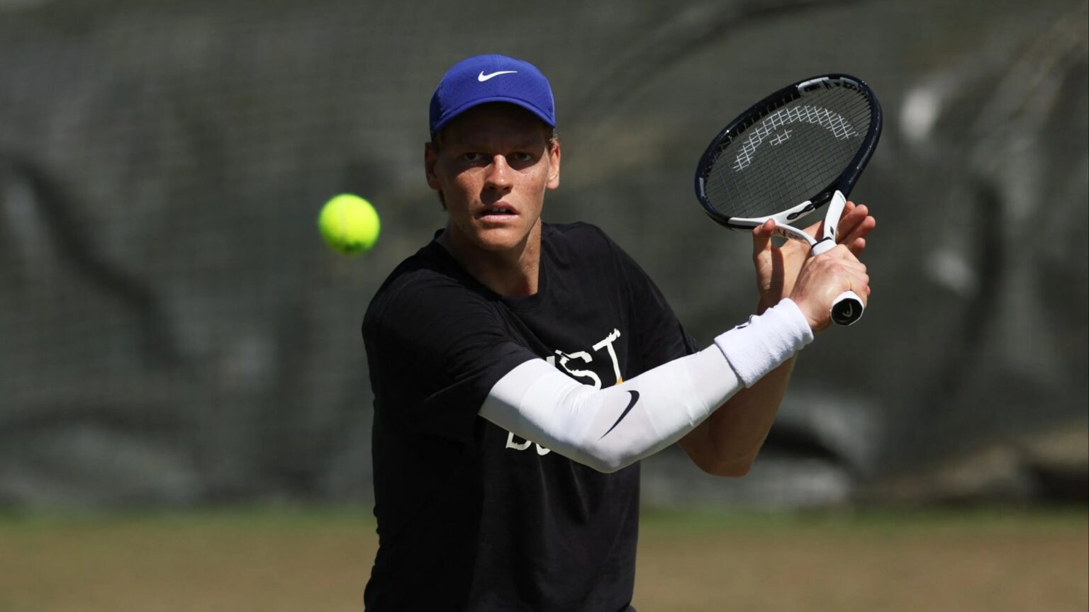 Why is Jannik Sinner wearing elbow strapping?