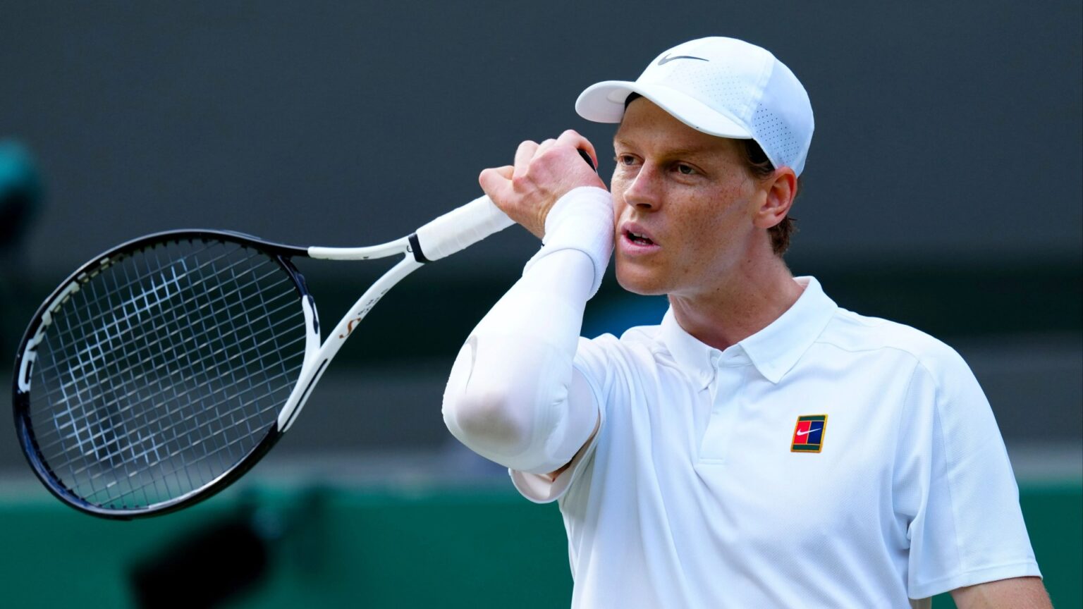 Why is Jannik Sinner wearing an elbow sleeve?