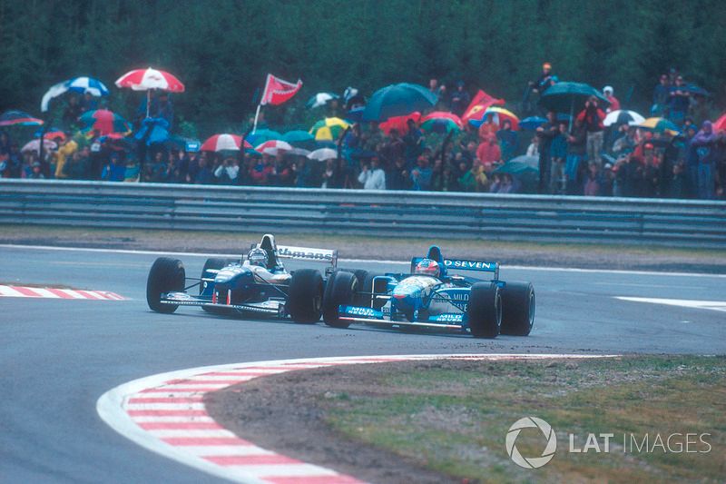 Hill admits that Schumacher got under his skin. Here's one of their many battles, at Spa
