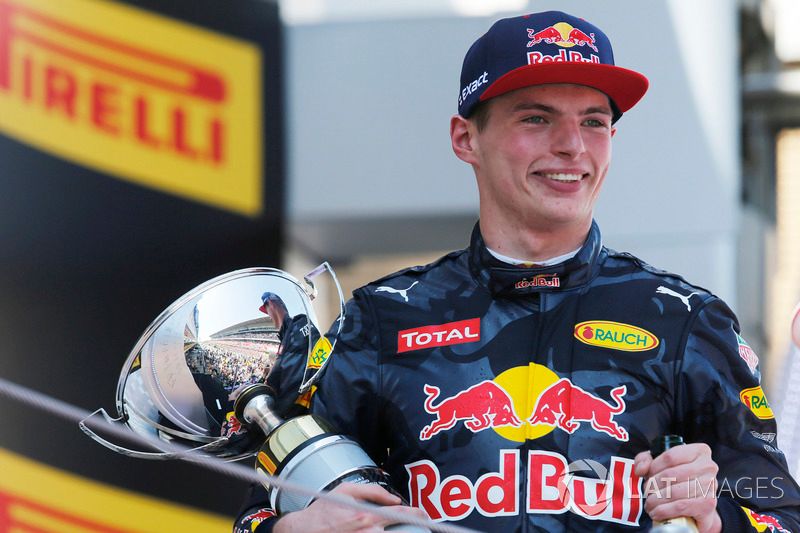 Max Verstappen, Red Bull, 1st Position, celebrates on the podium with his trophy