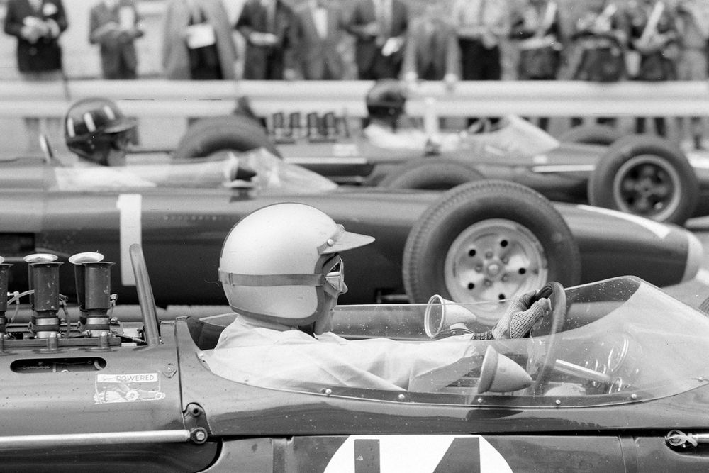 Brabham, Hill and Gurney line up on the three-wide front row of the grid