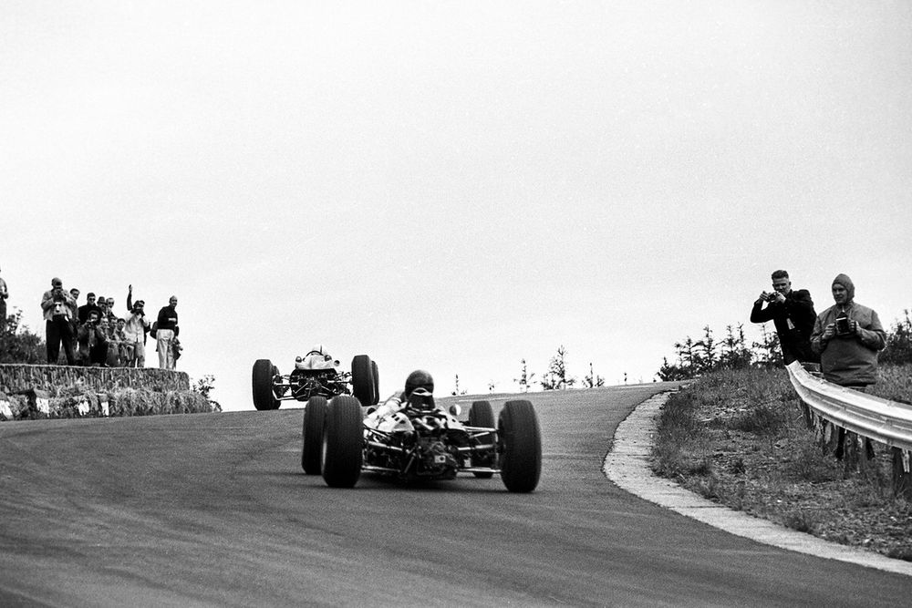 Gurney chases Surtees, who held a brief lead before his engine succumbed to ‘mechanical bothers’