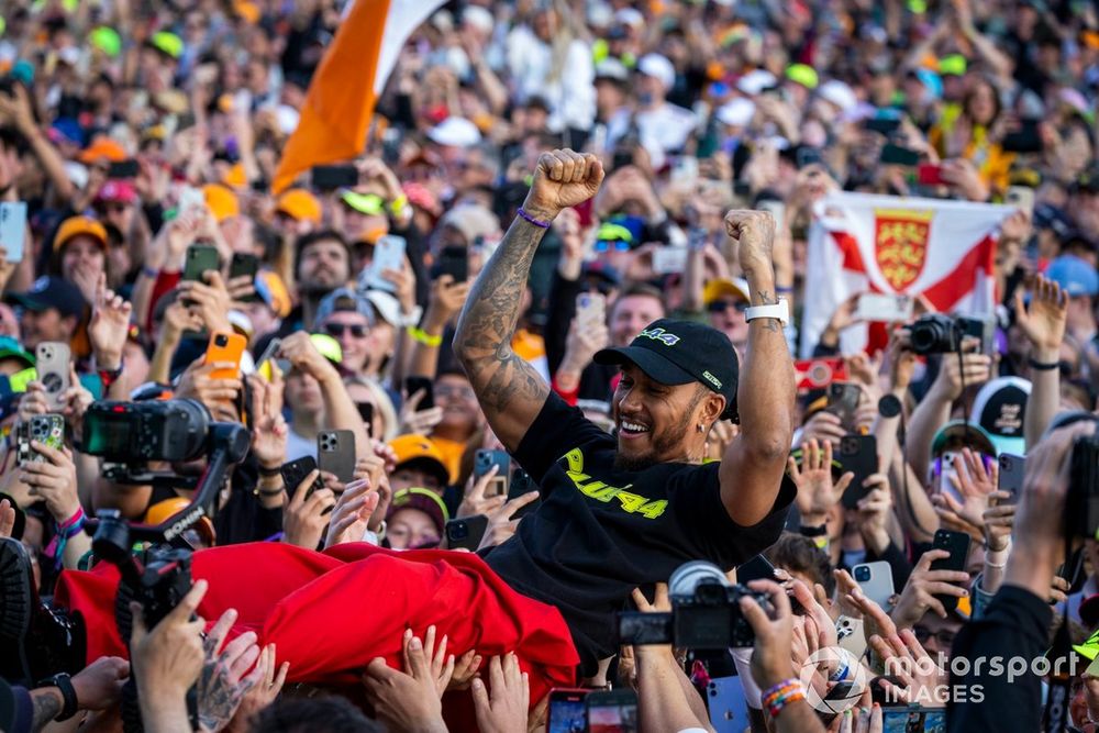 Lewis Hamilton crowd surfs at last year's British GP
