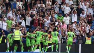Brighton 1 Fulham 1: Rodrigo Muniz scores last-gasp leveller… but jumps into stands to celebrate with WRONG fans