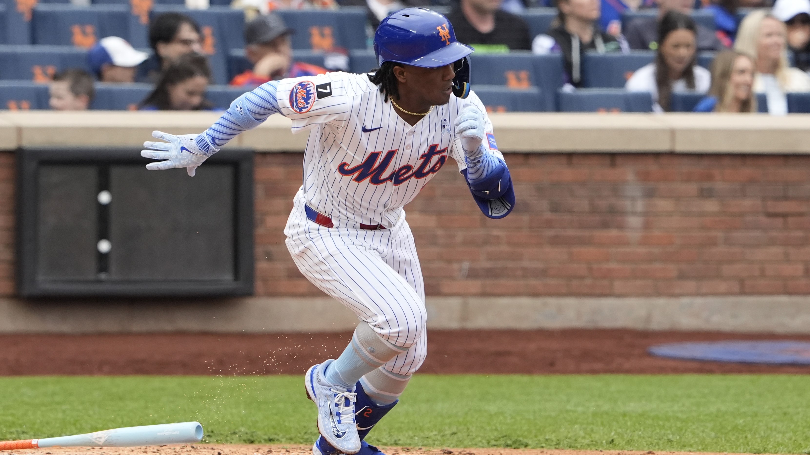Jun 15, 2025; New York City, New York, USA; New York Mets shortstop Luisangel Acuna (2) runs out a single against the Tampa Bay Rays during the third inning at Citi Field. Mandatory Credit: Gregory Fisher-Imagn Images