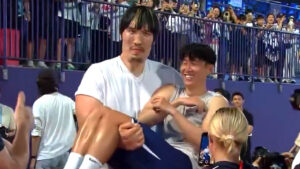 Incredible moment 7ft 2in MMA monster picks up Son Heung-min and cradles Tottenham legend like a baby