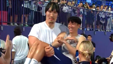 Incredible moment 7ft 2in MMA monster picks up Son Heung-min and cradles Tottenham legend like a baby