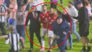 Classy Man Utd captain Bruno Fernandes protects Bryan Mbeumo after deciding penalty miss amid Grimsby pitch invasion