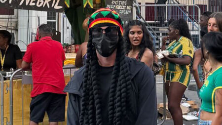 Chelsea star looks unrecognisable as he rocks up at Notting Hill Carnival – can you work out who it is?