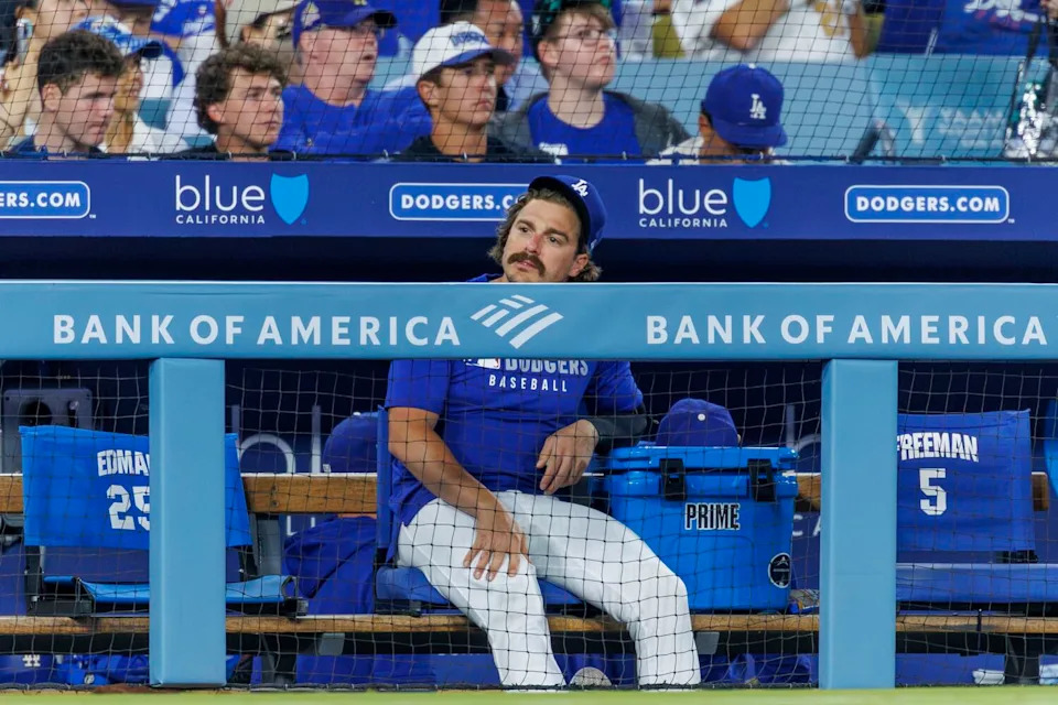 Dodgers utility player Kiké Hernández watches from the dugout during a game against the San Diego Padres on Aug. 15.