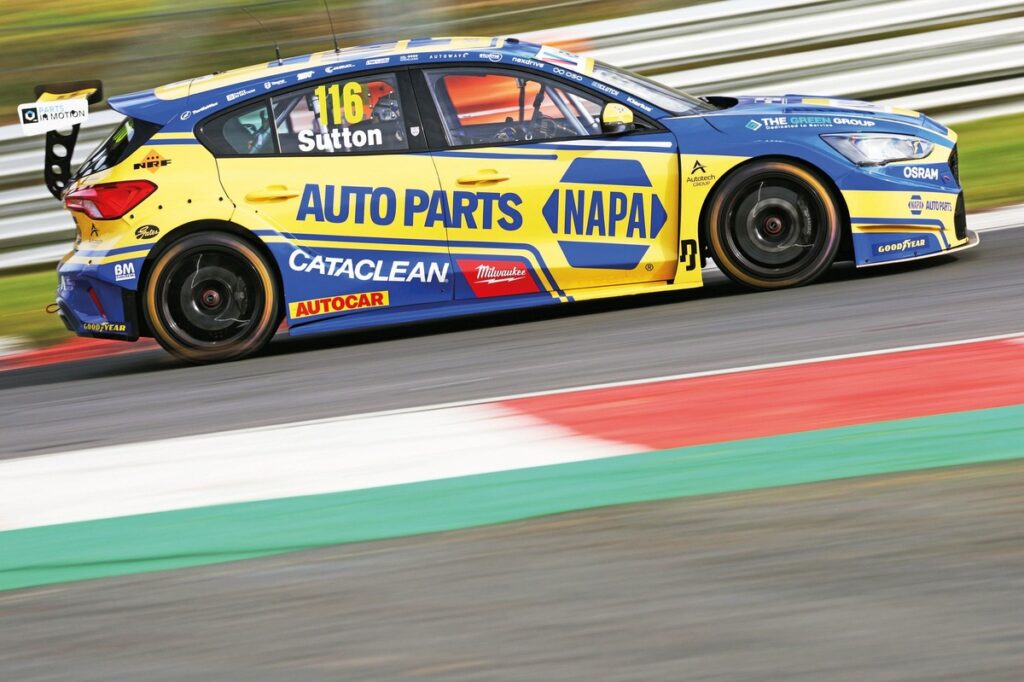 Sutton defeats Ingram in crash-strewn finale