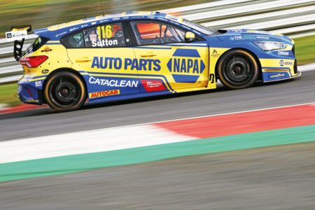 Sutton defeats Ingram in crash-strewn finale
