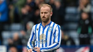 Crisis club Sheffield Wednesday have no idea whether their captain is allowed to play in Championship opener