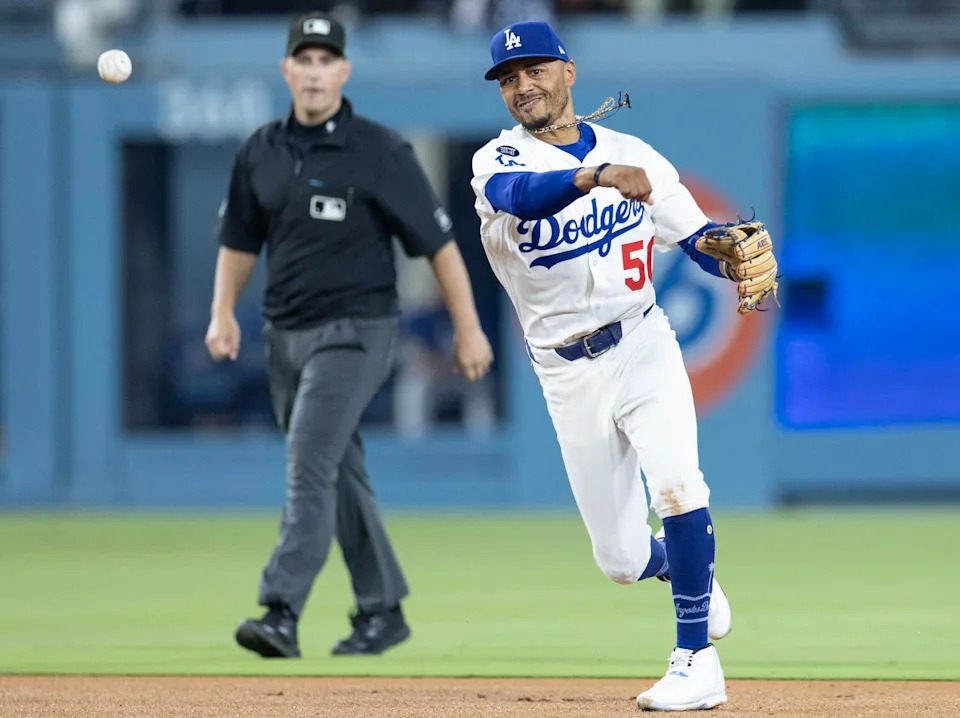 Dodgers shortstop Mookie Betts makes a play during a game against the St. Louis Cardinals at Dodger Stadium on Aug. 4.
