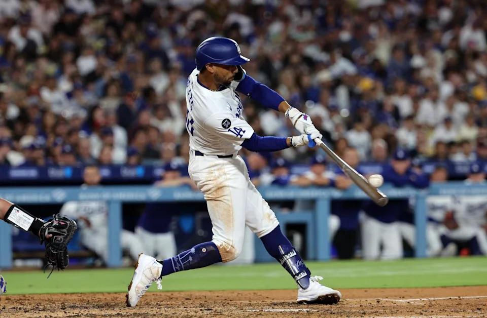 Mookie Betts hits a two-run home run for the Dodgers in the fifth inning Friday.