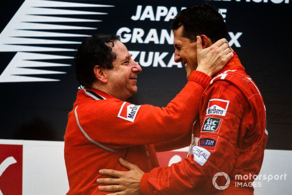 Jean Todt, Team Principal, Ferrari, and Michael Schumacher, 1st position, on the podium