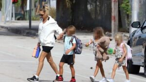 Reclusive tennis icon Anna Kournikova is unrecognisable in rare sighting as a devoted mum after wheelchair health fears