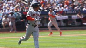 Devers homers early and Giants blank Nationals 5-0